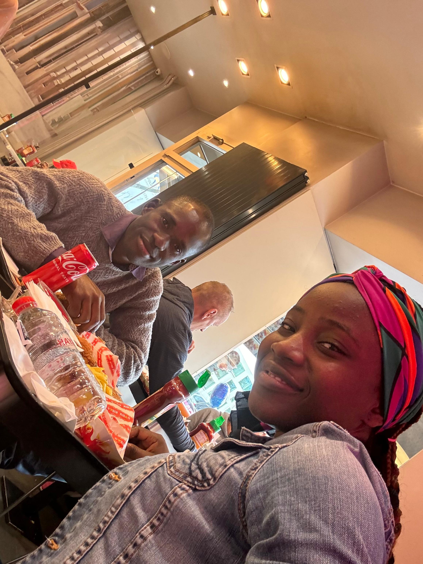 Busolami and Tunde sharing a meal together