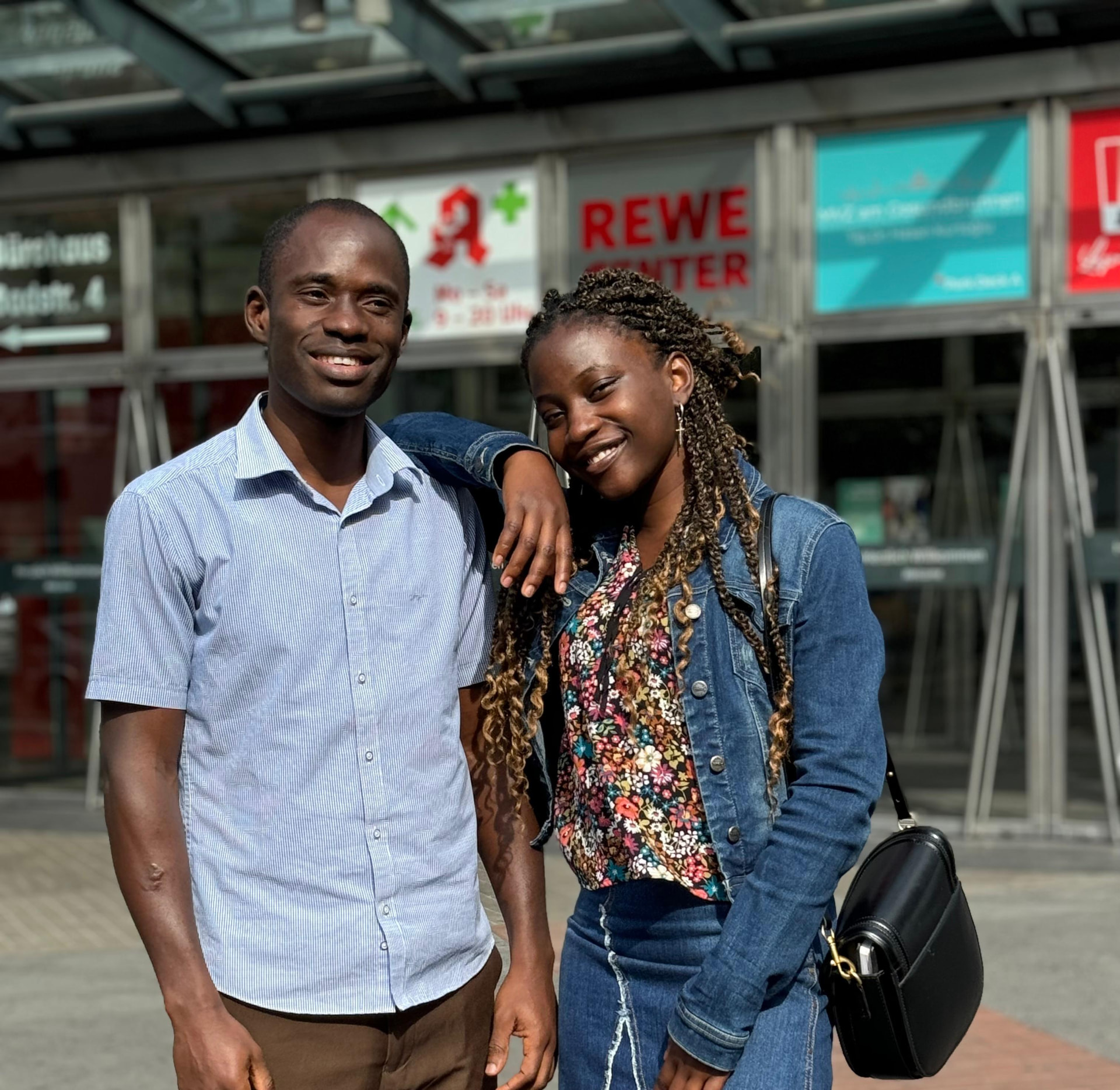 Busolami and Tunde smiling together in the city